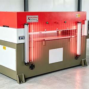 What is the purpose of equipping a safety light curtain on a die cutting press machine?