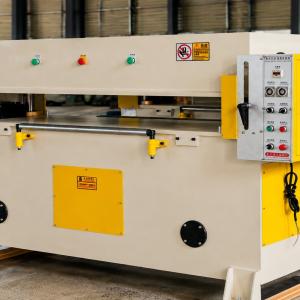 What is the purpose of adopting a dual-cylinder design in a die cutting press machine?